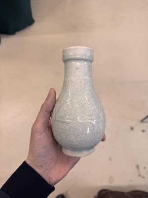 Lot 454 - A Chinese Qingbai 'floral scroll' vase, Song dynasty