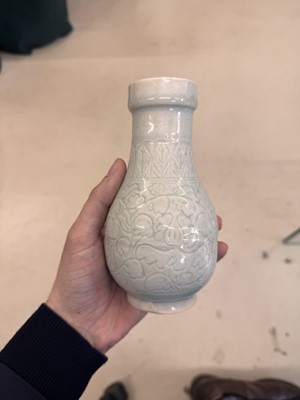 Lot 454 - A Chinese Qingbai 'floral scroll' vase, Song dynasty