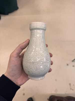 Lot 454 - A Chinese Qingbai 'floral scroll' vase, Song dynasty