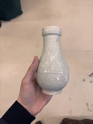 Lot 454 - A Chinese Qingbai 'floral scroll' vase, Song dynasty