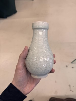 Lot 454 - A Chinese Qingbai 'floral scroll' vase, Song dynasty