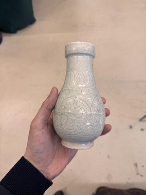 Lot 454 - A Chinese Qingbai 'floral scroll' vase, Song dynasty