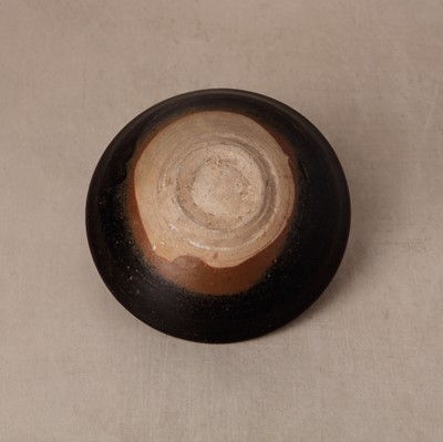 Lot 457 - A Chinese Jizhou glazed-glaze 'floral' painted bowl, Southern Song dynasty