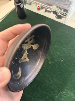Lot 457 - A Chinese Jizhou glazed-glaze 'floral' painted bowl, Southern Song dynasty