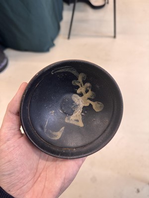 Lot 457 - A Chinese Jizhou glazed-glaze 'floral' painted bowl, Southern Song dynasty
