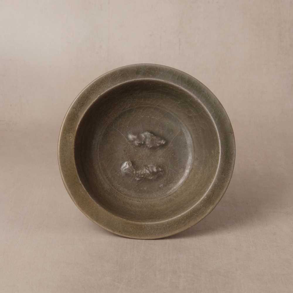 Lot 459 - A Chinese Longquan celadon 'twin fish' moulded dish, Song/Ming dynasty