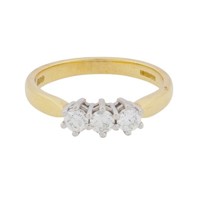 Lot 323 - A diamond three stone ring, circa 2001