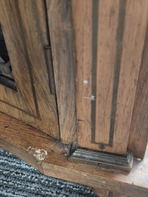 Lot 4 - A pair of Regency style rosewood and brass inlaid credenzas