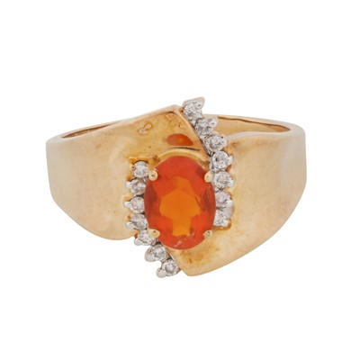 Lot 98 - A fire opal and diamond crossover ring, circa 2001