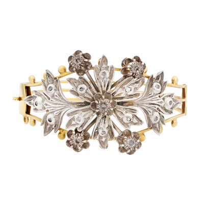 Lot 405 - A diamond flower bangle