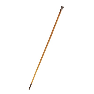 Lot 218 - λ A Chinese silver-tipped rhinoceros horn walking cane, late 19th century