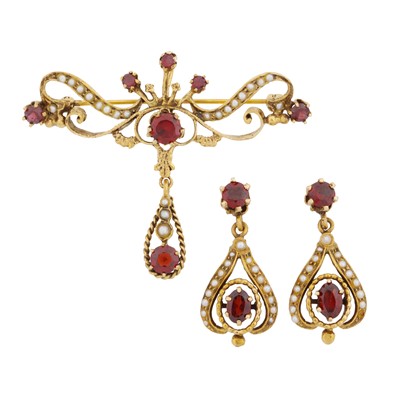 Lot 147 - A garnet and seed pearl brooch and earring suite