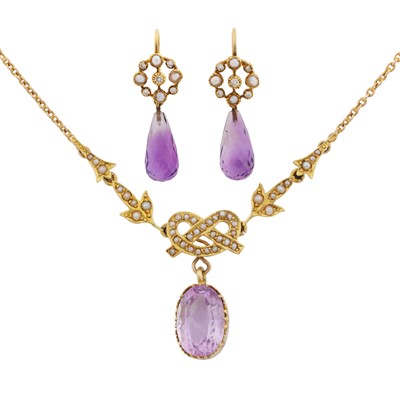 Lot 217 - An amethyst and seed pearl necklace and pendent earrings