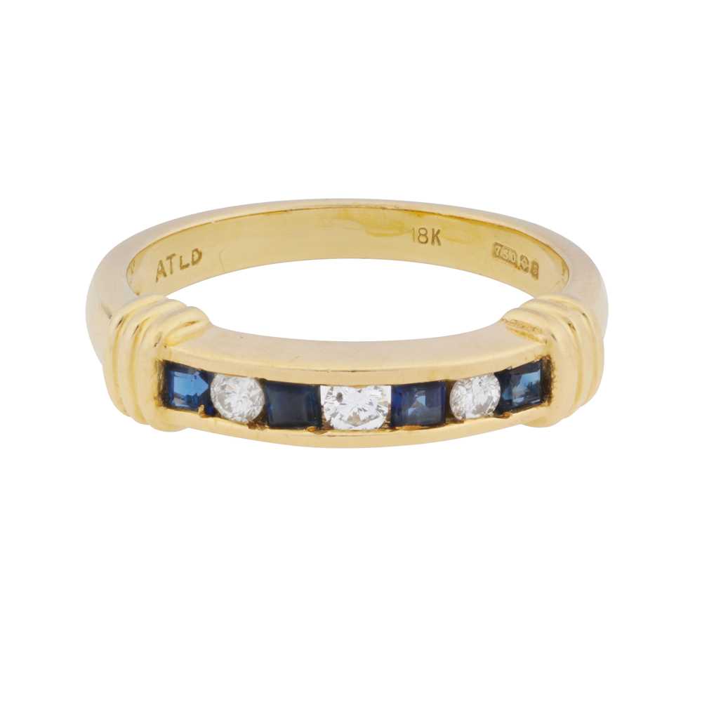 Lot 34 - A sapphire and diamond band ring, circa 1992
