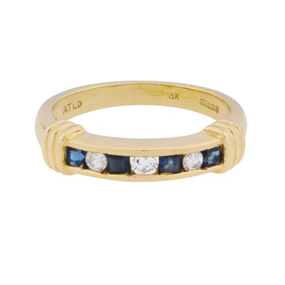 Lot 34 - A sapphire and diamond band ring, circa 1992