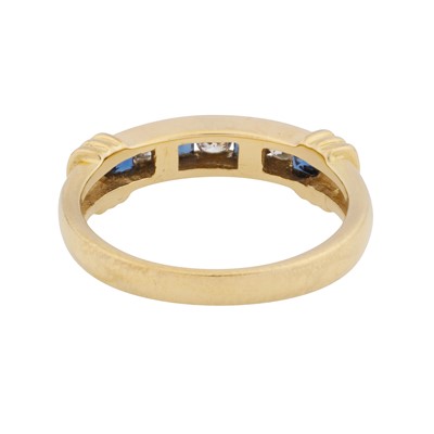 Lot 34 - A sapphire and diamond band ring, circa 1992