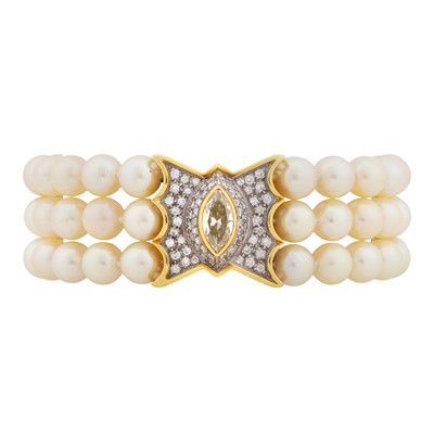 Lot 81 - Theo Fennell Ι A diamond and cultured pearl three-row bracelet