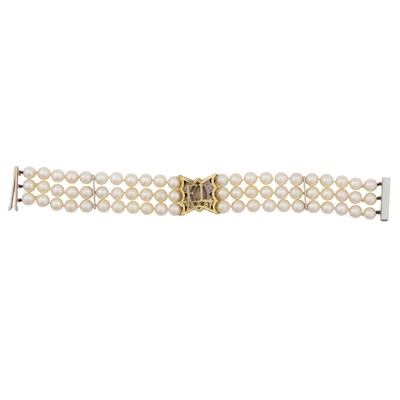 Lot 81 - Theo Fennell Ι A diamond and cultured pearl three-row bracelet