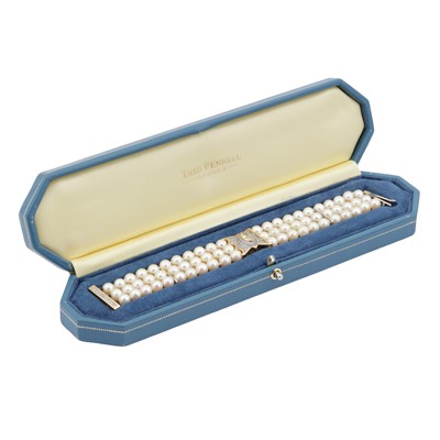 Lot 81 - Theo Fennell Ι A diamond and cultured pearl three-row bracelet