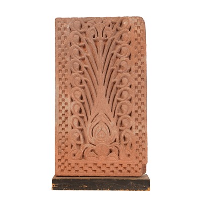 Lot 228 - A carved red sandstone architectural fragment