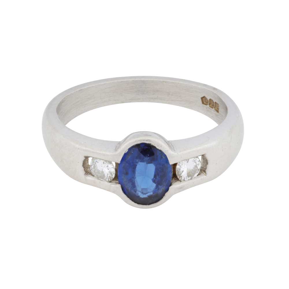 Lot 66 - A sapphire and diamond three stone ring