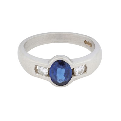 Lot 66 - A sapphire and diamond three stone ring