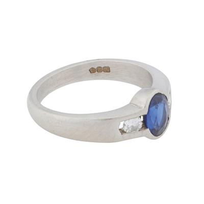 Lot 66 - A sapphire and diamond three stone ring