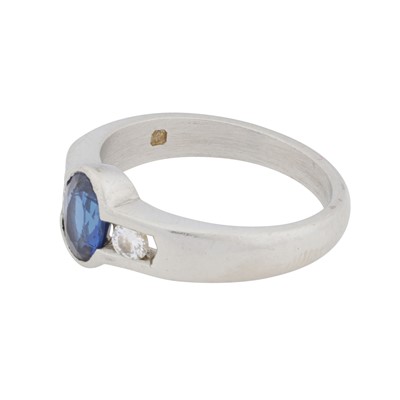 Lot 66 - A sapphire and diamond three stone ring