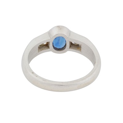 Lot 66 - A sapphire and diamond three stone ring