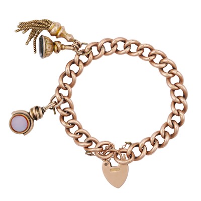Lot 10 - A curb link heart lock bracelet