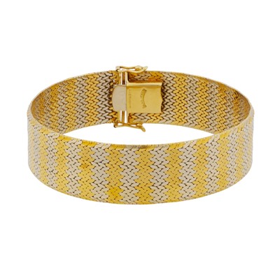 Lot 174 - A two colour fancy link bracelet, circa 1968