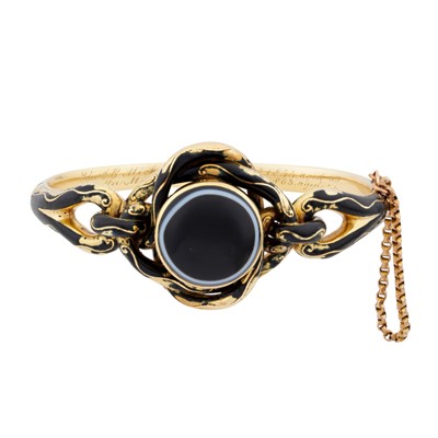 Lot 13 - An enamel and banded agate mourning bangle