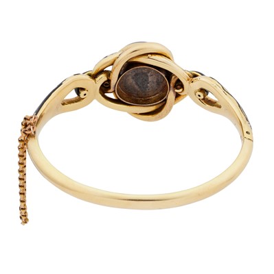 Lot 13 - An enamel and banded agate mourning bangle
