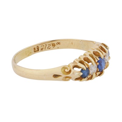 Lot 23 - A sapphire and diamond five stone ring