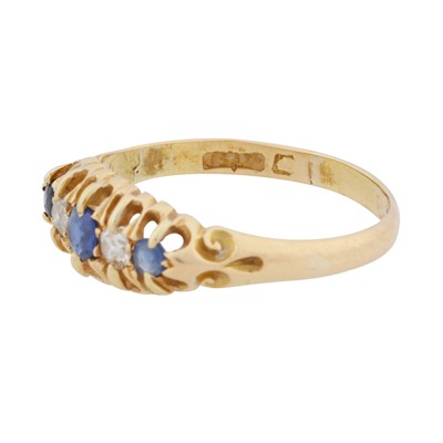 Lot 23 - A sapphire and diamond five stone ring