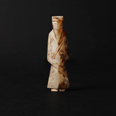 Lot 537 - A Chinese archaistic jade figure of a scholar, 18th/19th century or earlier