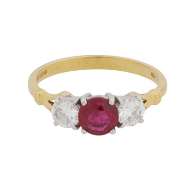 Lot 156 - A ruby and diamond three-stone ring, circa 1992