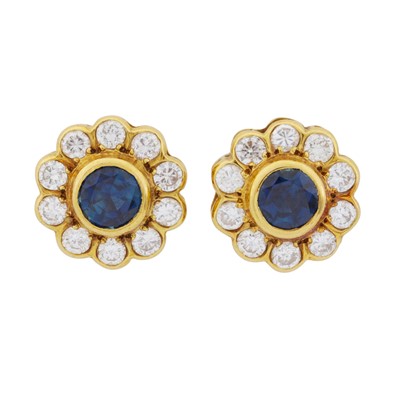 Lot 31 - A pair of sapphire and diamond flower stud earrings