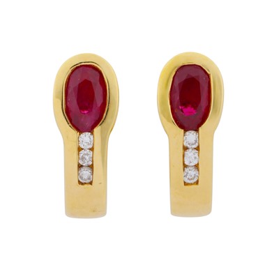 Lot 157 - A pair of ruby and diamonds earrings