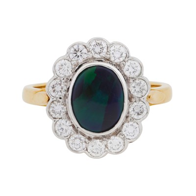 Lot 402 - A black opal and diamond cluster ring