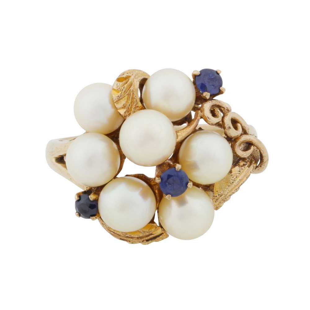 Lot 33 - A sapphire and pearl dress ring