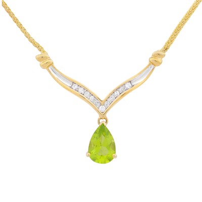 Lot 111 - A peridot and diamond pendant necklace