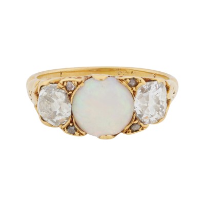 Lot 134 - An opal and diamond three stone ring