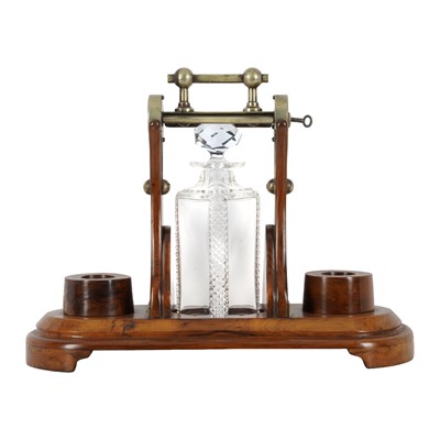 Lot 326 - A Grinsell's Patent walnut and silver plated tantalus