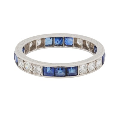 Lot 51 - A sapphire and diamond full eternity ring