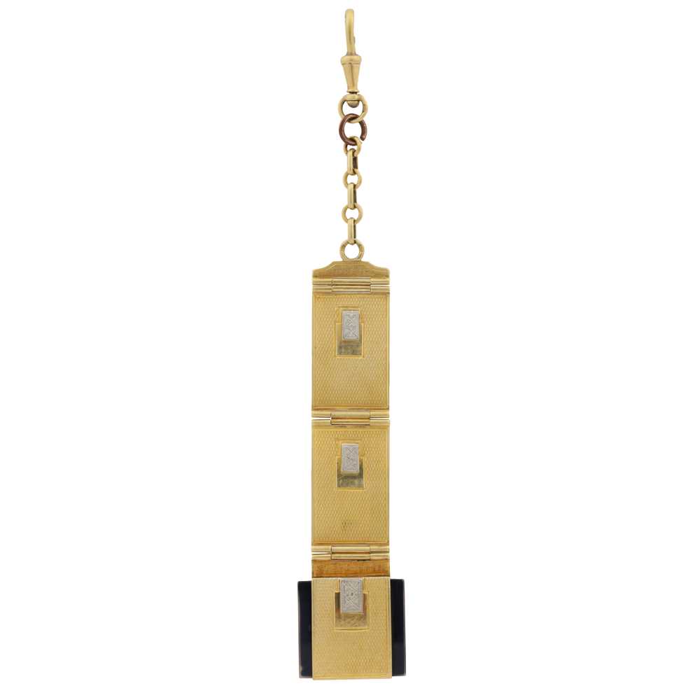 Lot 12 - An onyx chatelaine fob chain