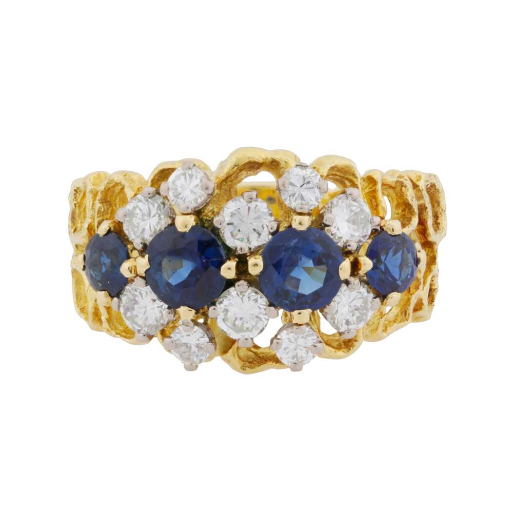 Lot 29 - A sapphire and diamond ring, circa 1975