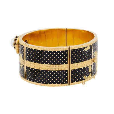 Lot 4 - An enamel, pearl and diamond bangle