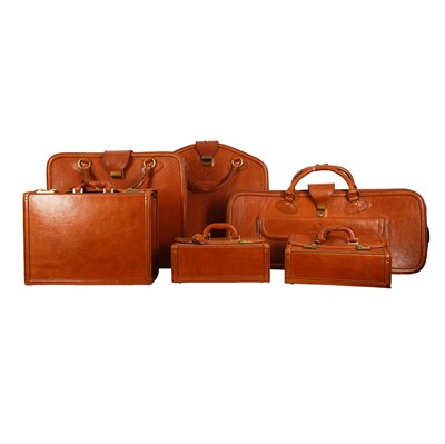 Lot 233 - A six-piece set of leather luggage for Ferrari Testarossa by Schedoni, Italian