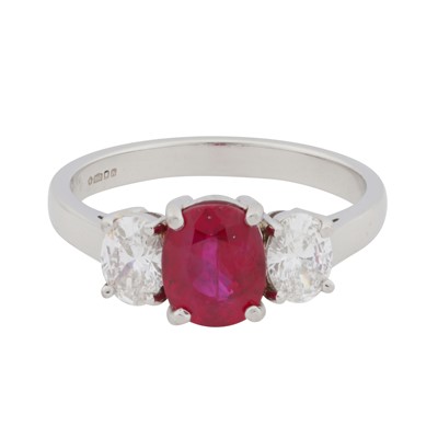 Lot 88 - A three-stone ruby and diamond ring, circa 2007